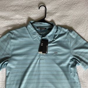 Light blue Travis matthews golf shirt. Brand new